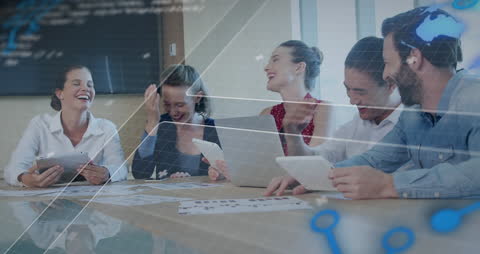 Business Team Analyzing Data in Modern Office with Futuristic Overlay