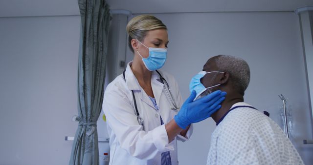 Doctor conducting health examination on elderly patient, both wearing face masks. Suitable for medical care brochures, healthcare advertisements, hospital websites, or materials promoting senior health.