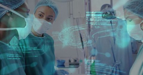 Surgical team consulting with holographic data overlay during high-tech operation
