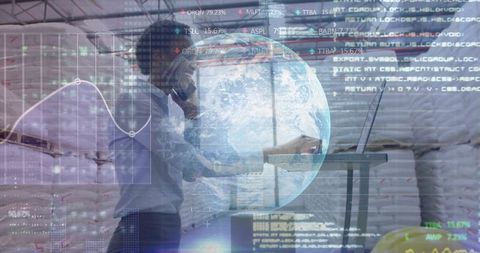 Female warehouse manager using phone and laptop with global data overlay