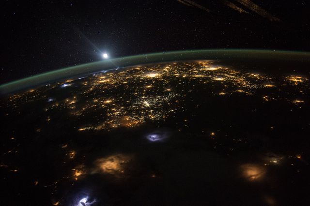 View of Earth at Night from Space with City Lights - Download Free Stock Photos Pikwizard.com