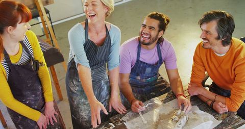 Joyful Group Enjoys Creative Pottery Class Together - Download Free Stock Images Pikwizard.com