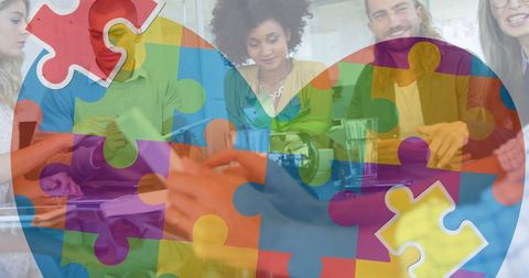 Business team support with autism awareness symbol