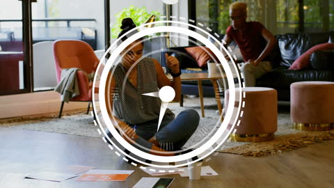 Digital Clock Overlay on Diverse Women Collaborating in Modern Office