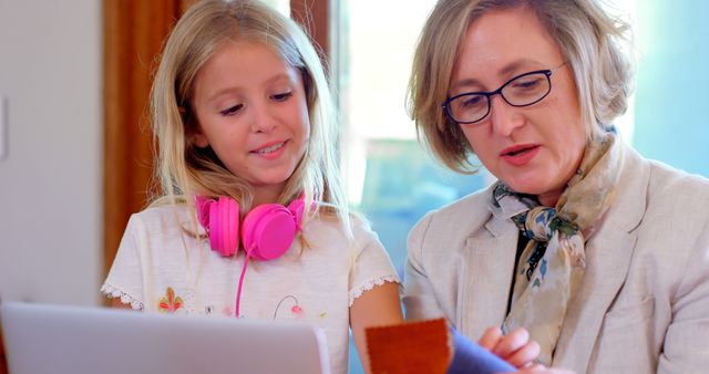 Teacher and Young Girl Collaborating on Laptop - Download Free Stock Images Pikwizard.com