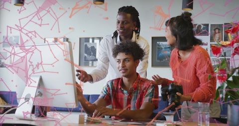 Creative Team Celebrating Success in Modern Office