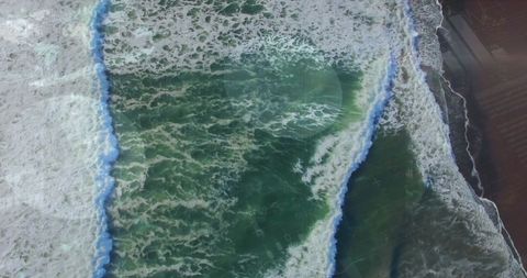 Financial Charts Overlay Ocean Landscape for Economic and Nature Balance