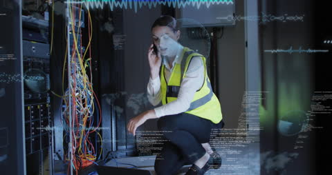 Female Engineer Communicates in High-Tech Server Room
