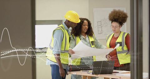 Architects Reviewing Blueprints with Financial Analytics Interface - Download Free Stock Images Pikwizard.com