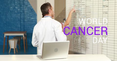 Healthcare Professional Reviewing Patient Data on World Cancer Day - Download Free Stock Images Pikwizard.com