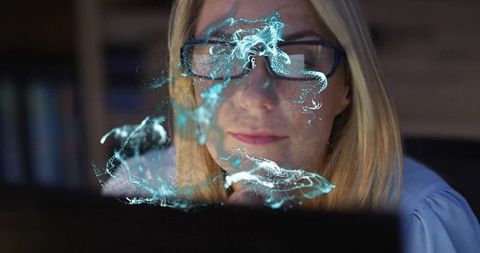 mature woman analyzing digital holographic wave pattern in study - Download Free Stock Images Pikwizard.com