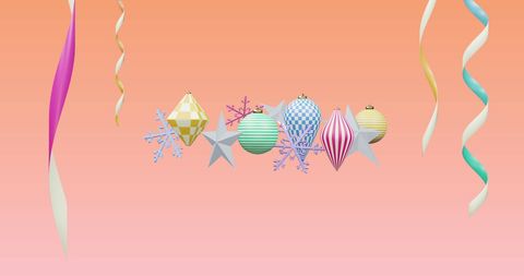 Colorful Christmas Ornaments Hanging with Ribbons on Pink Gradient