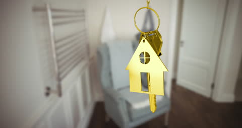 Golden House Key Reflecting Real Estate Concepts