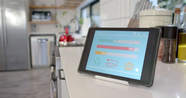 Smart Home Tablet Displaying Energy Usage in Modern Kitchen - Download Free Stock Images Pikwizard.com