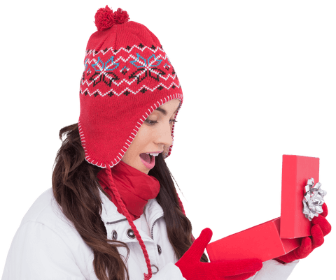 Excited woman in santa hat opening christmas gift transparent background
