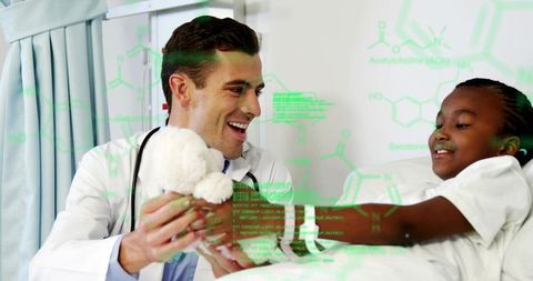 Doctor offering comforting support to child patient with teddy bear