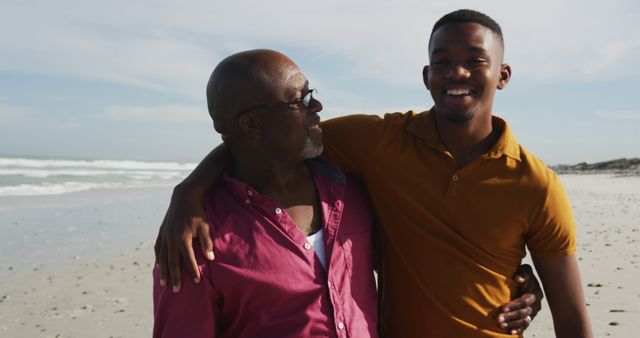 Father and Son Hugging on Sunny Beach - Download Free Stock Images Pikwizard.com