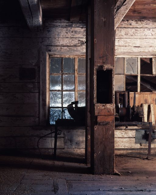 This wooden workshop scene captures rustic charm and nostalgia, ideal for backgrounds, historical storytelling, or illustrating concepts like abandonment, craftsmanship, and bygone eras. Perfect for articles, blogs, and designs focused on history, woodworking, or rustic aesthetics.