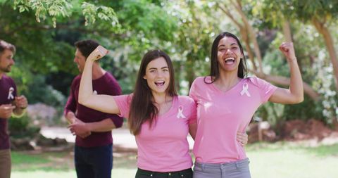 Diverse Women Embracing for Breast Cancer Awareness in Park - Download Free Stock Images Pikwizard.com