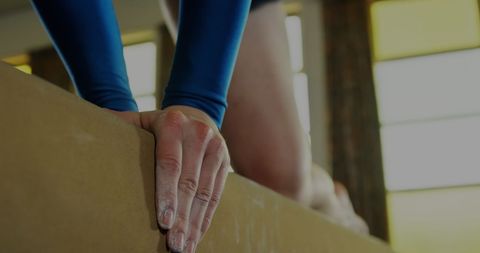 Gymnast Focusing on Balance Beam during Training Session