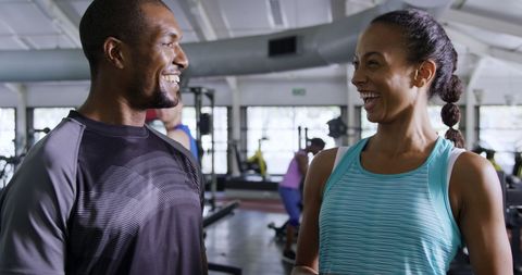 Diverse Fitness Enthusiasts Smiling at Modern Gym - Download Free Stock Images Pikwizard.com