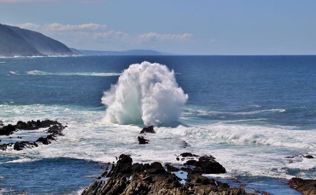 Dramatic Ocean Wave Splashing on Rocky Coast - Download Free Stock Photos Pikwizard.com