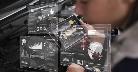Woman Using Tablet with Augmented Reality Car Diagnostics Over Engine Bay in Workshop