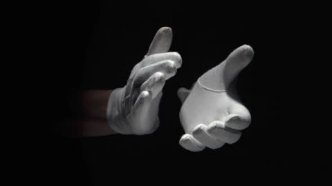 White Gloved Hands Clapping in Darkness Slow Motion