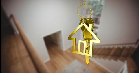 Golden House Keychain Symbolizing New Home Ownership