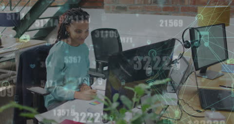 Businesswoman Analyzing Data Connections in Modern Office