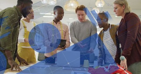 Diverse Team Collaborating in Tech-Focused Office