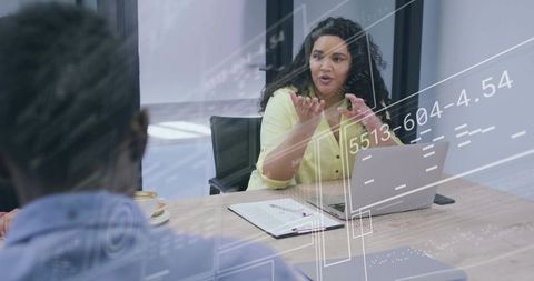 Businesswoman Leading Dynamic Team Discussion in Modern Office