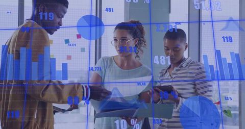 Business Team Analyzing Data Charts on Transparent Board