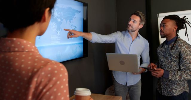 Business Team Analyzing Data On Interactive Screen - Download Free Stock Images Pikwizard.com