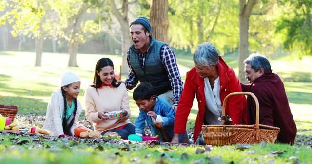 Three Generation Family Enjoying Picnic in Park - Download Free Stock Images Pikwizard.com