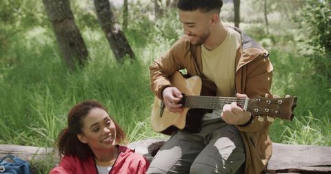 Romantic Outdoor Guitar Session with a Happy Couple