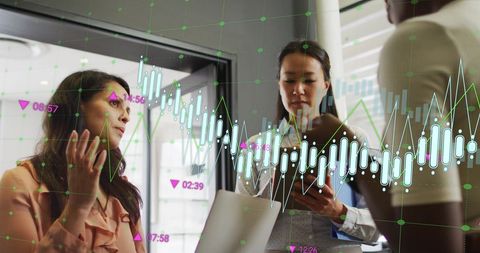 Business Team Analyzing Data with Futuristic Graph