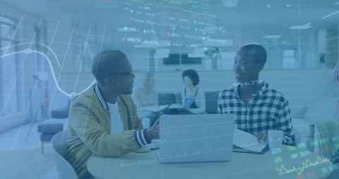 Diverse colleagues collaborating amid digital financial data