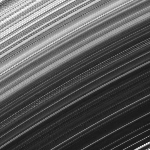 Detailed image showing Saturn’s B ring captured by the Cassini spacecraft, highlighting brightness variations along the orbital direction. Useful for educational materials, scientific presentations, space exploration articles, and inspirational imagery for astronomy enthusiasts.