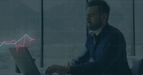 Focused professional analyzing financial charts on laptop with grid overlay and skyline