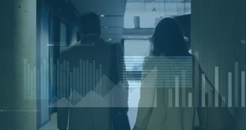 Business Colleagues Analyzing Data with Overlaid Graphs