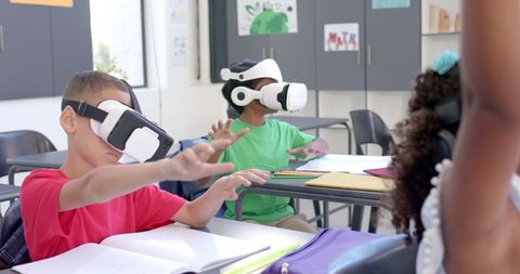 Diverse Students Using VR Headsets for Innovative Learning
