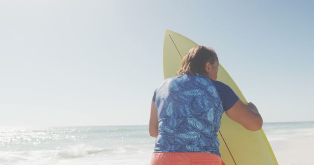 Person Preparing Surfboard on Sunny Beach - Download Free Stock Images Pikwizard.com