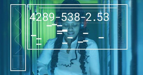 Woman monitoring server racks with futuristic interface overlay