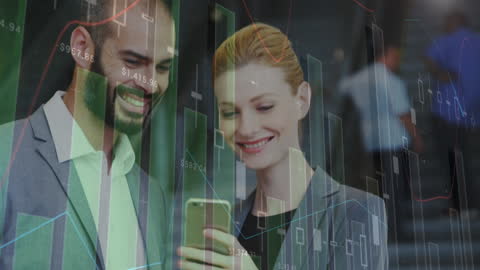 Smiling Business Team Analyzing Financial Data on Mobile