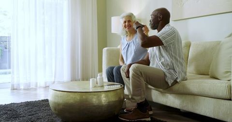 Senior Couple Organizing Medications at Home