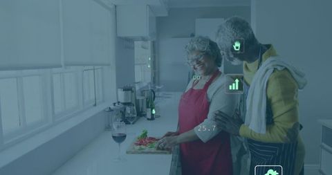 Senior couple cooking in sunlit modern kitchen, chopping vegetables and sharing affection