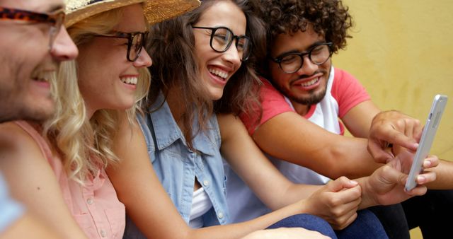 Diverse Group of Friends Using Smartphone, Smiling and Having Fun - Download Free Stock Images Pikwizard.com