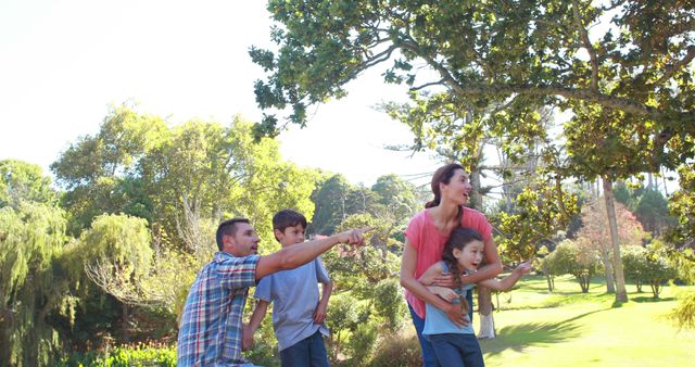 Happy Family Enjoying Summer Day in Nature Park - Download Free Stock Images Pikwizard.com