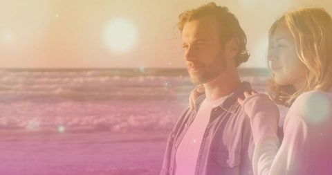 Couple Enjoys Romantic Beach View with Soft Pastel Glow